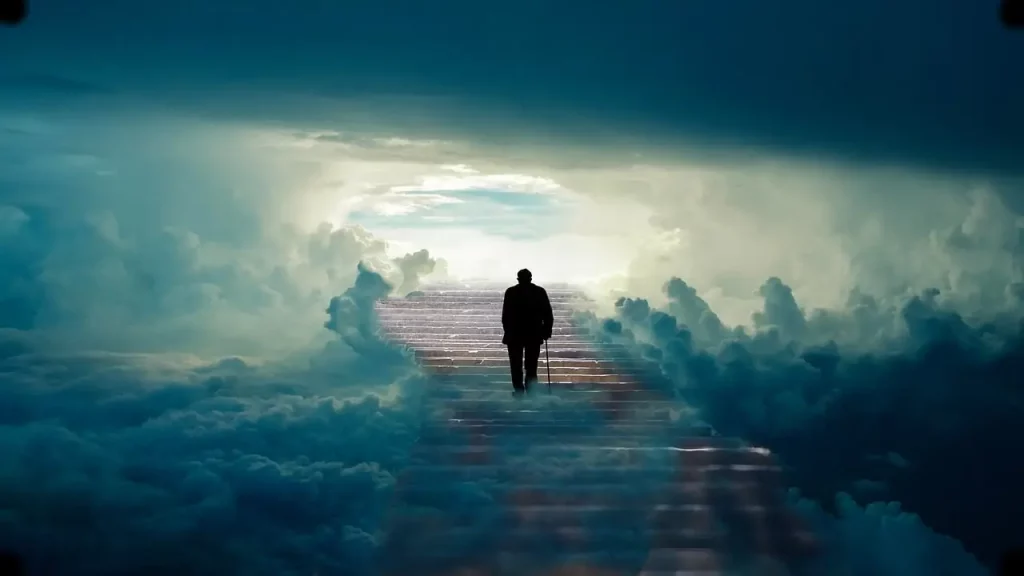Cette image saisissante dépeint un homme gravissant un escalier à travers les nuages, se dirigeant avec détermination vers l'au-delà. Une lumière éclatante illumine le bout du chemin, évoquant une accueillante destination. Découvrez le voyage spirituel capturé dans cette scène, symbolisant l'ascension vers un au-delà accueillant et paisible.