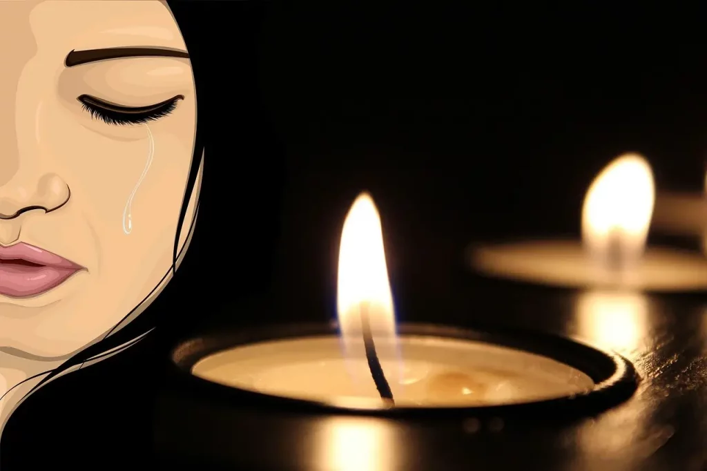 Contemplez cette scène émouvante : une femme exprime sa tristesse après avoir perdu quelqu'un de cher. Cependant, au milieu de sa peine, une lueur d'espoir persiste. Une bougie allumée, symbole poignant de la présence persistante malgré l'absence physique. Un hommage lumineux à la mémoire de ceux qui restent gravés dans nos cœurs.