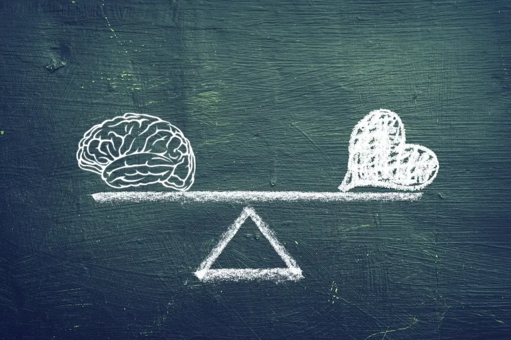 Plongez dans la symbolique de cette image : une balance délicate entre le cerveau et le cœur, représentant les émotions que nous ressentons au quotidien. Cet équilibre subtil est essentiel pour comprendre nos émotions et adopter des comportements adaptés. Découvrez l'importance de cet équilibre dans notre vie émotionnelle et comment il peut nous guider vers une meilleure compréhension de nous-mêmes. 